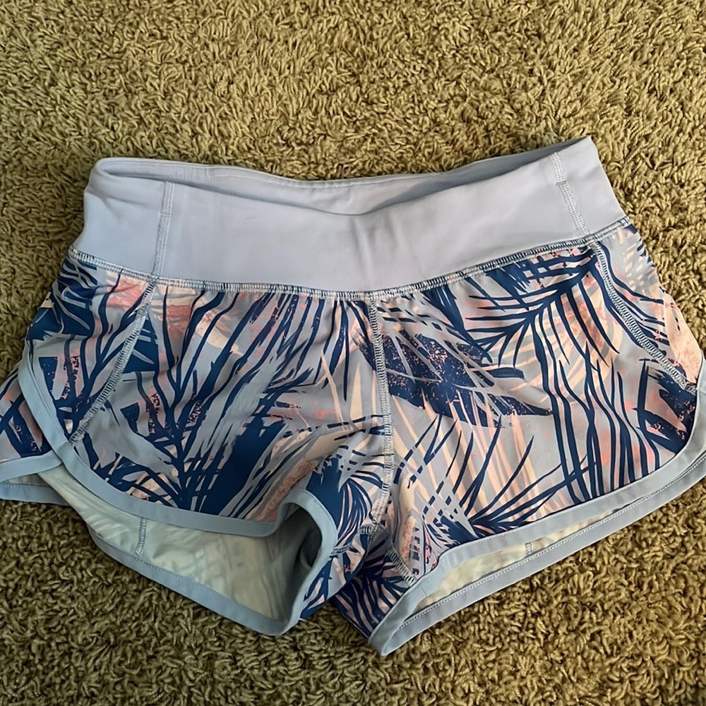 Selling floral purple and pink size 12 girls Ivivva shorts